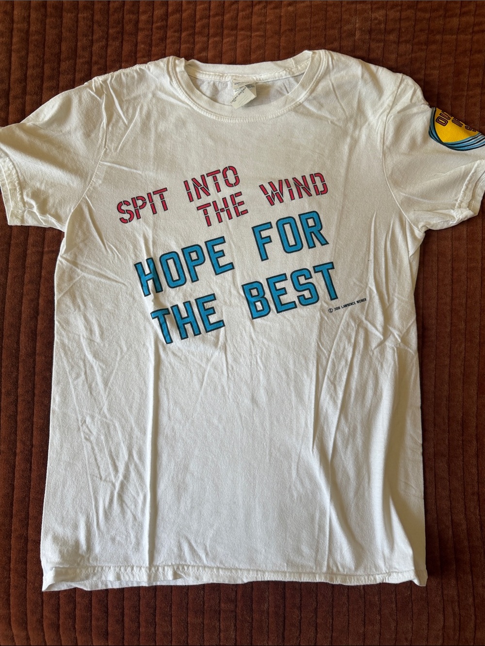 LAWRENCE WEINER Out of Sight Tee with Blue & Red Graphic Text